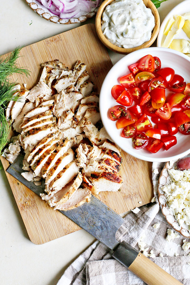 photo of sliced grilled chicken that was marinated in a Greek marinade for chicken