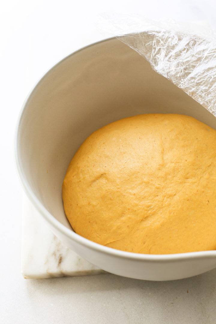 photo showing an example of pumpkin yeast dough that has doubled in bulk after rising