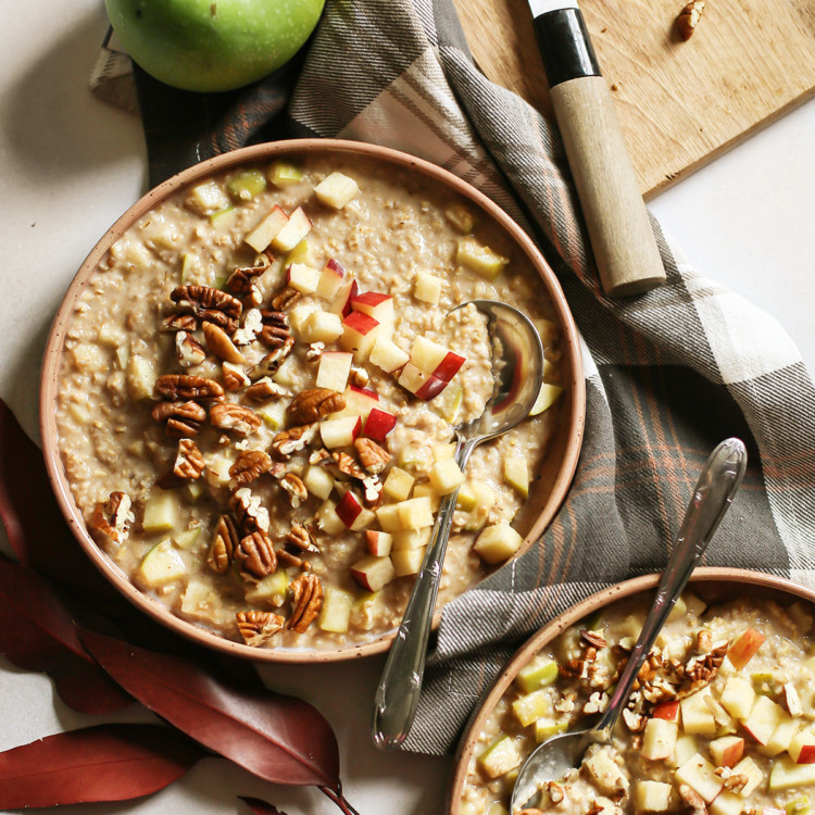 overhead photo of two bowls of overnight apple oats