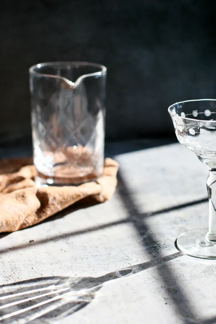 photo of a coupe glass - the kind of glass you serve a black manhattan in