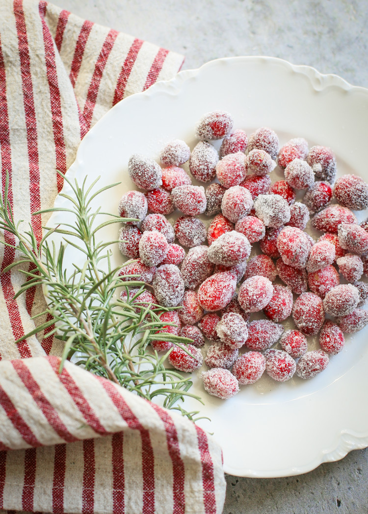 sugared cranberries on a white plate