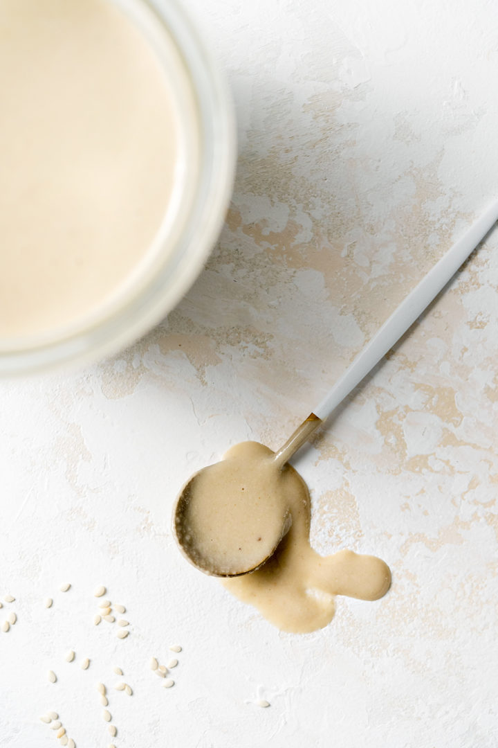 photo of a spoonful of homemade tahini