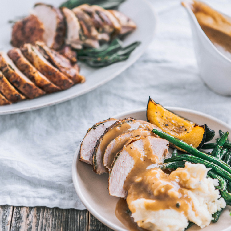 photo of a table set with thanksgiving food