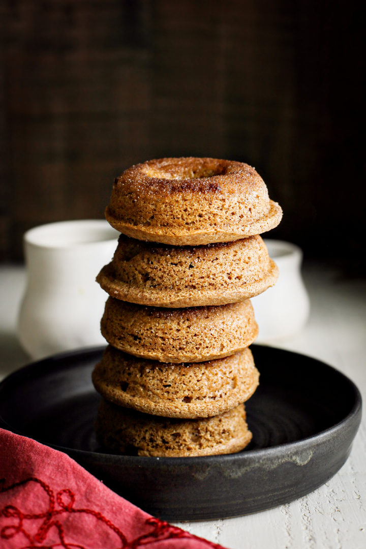 a stack of cinnamon donuts from this baked donuts recipe 