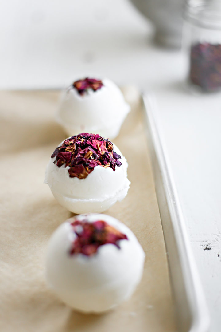photo of bath of this recipe for diy bath bomb on a parchment paper lined baking sheet