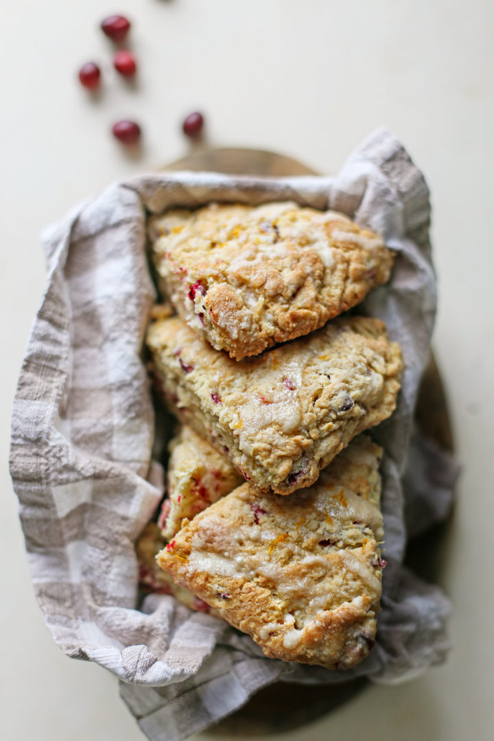 photo of cranberry orange scones in a bread basket