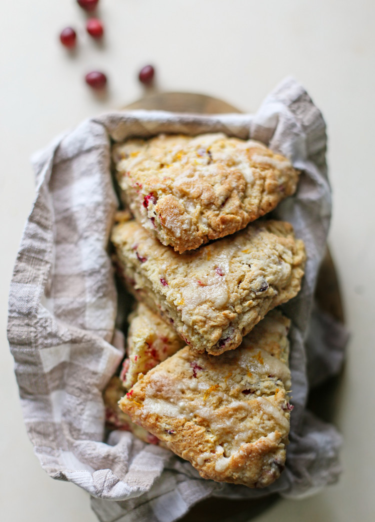 photo of cranberry orange scones in a bread basket