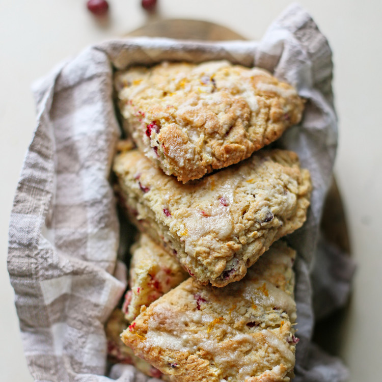 photo of cranberry orange scones in a bread basket