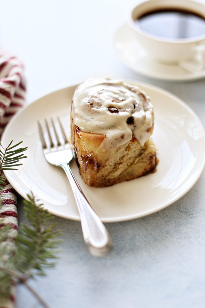 photo of a serving of the best homemade cinnamon rolls on a white plate