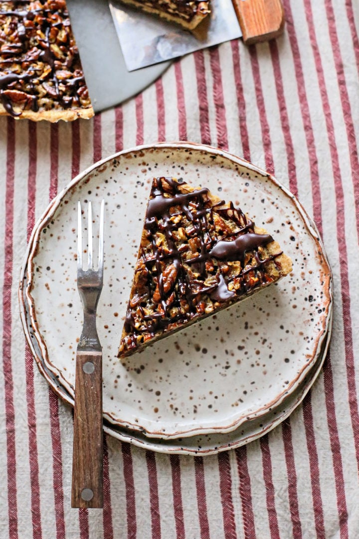 photo of a serving of a slice of mini pecan pie tarts
