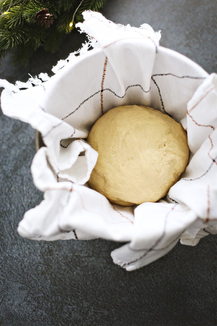 photo of dough rising for the best homemade cinnamon rolls ever