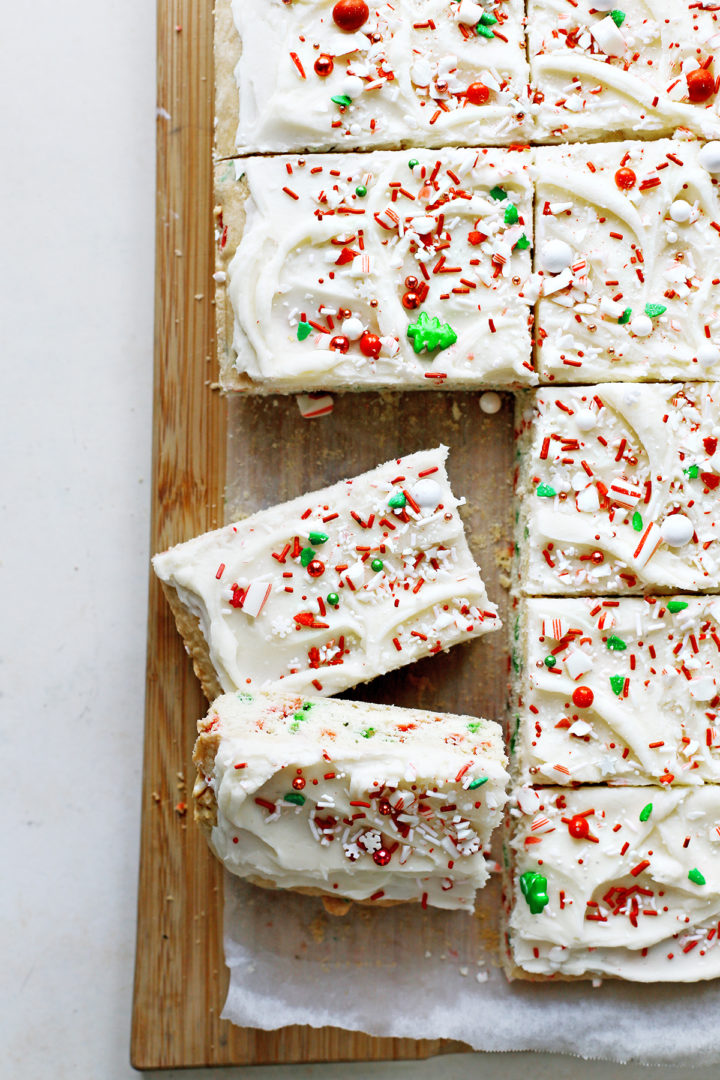 overhead photo of christmas sugar cookie bars on a cutting board