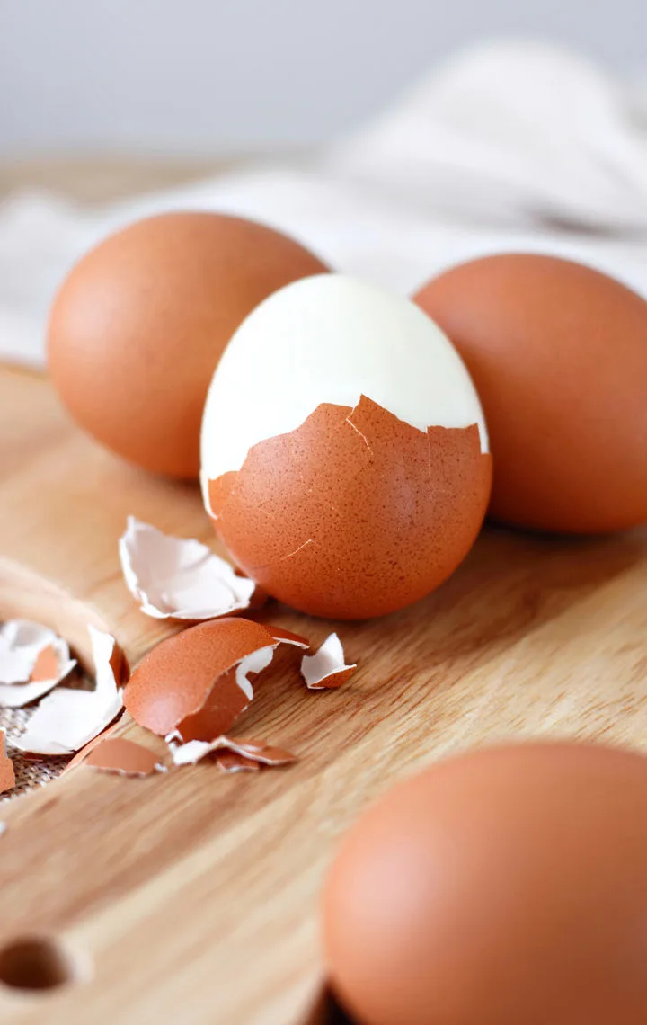 photo of microwave hard boiled eggs being peeled