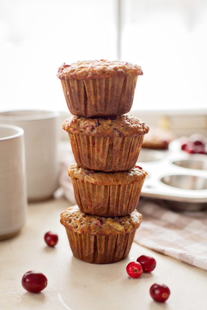 a stack of cranberry muffins