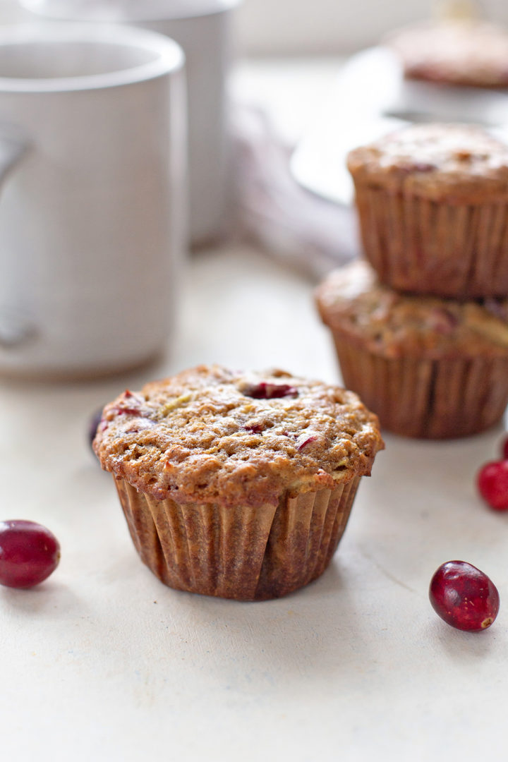 close up photo of a muffin from this recipe for cranberry muffins