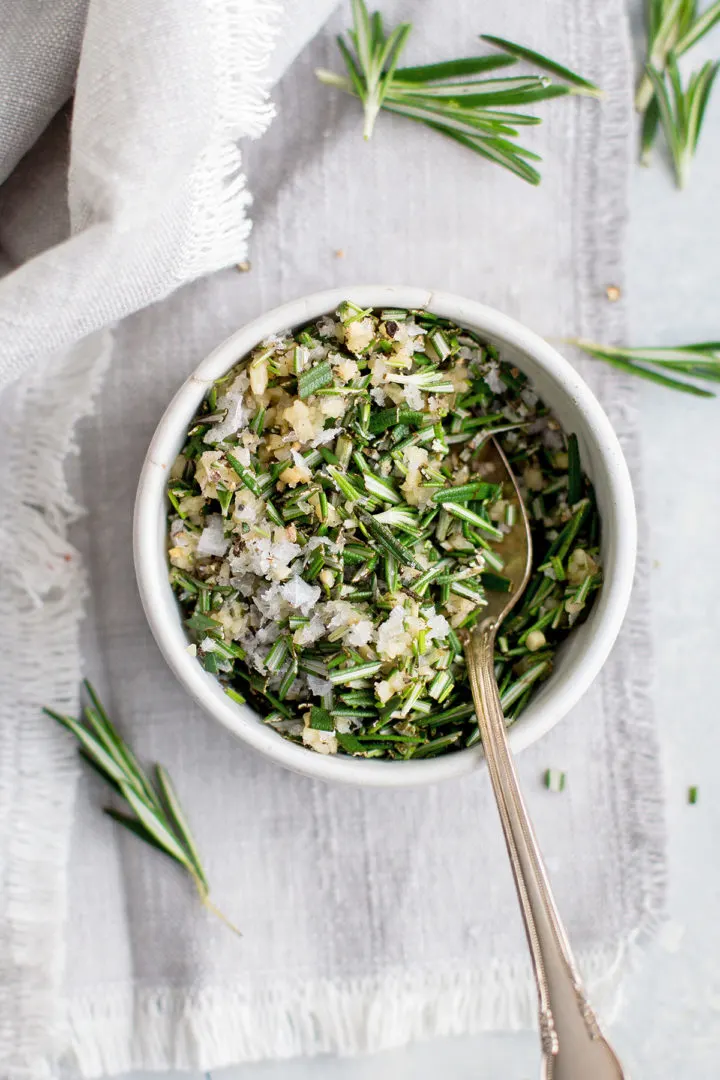 photo of rosemary and garlic in a bowl for use in this recipe for rosemary focaccia bread