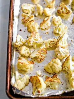photo of roasted cauliflower on a baking sheet