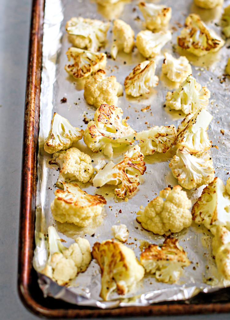 photo of roasted cauliflower on a baking sheet