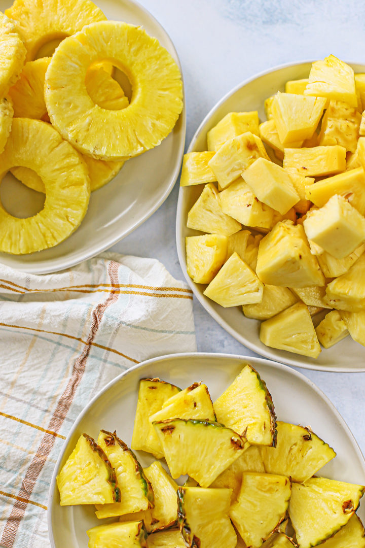 3 plates with pineapple cut up showing different ways to cut fresh pineapple