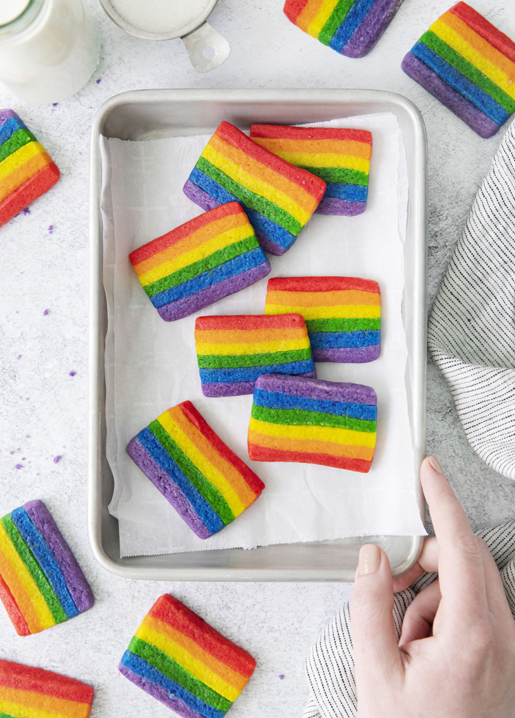 photo of a baking sheet with rainbow sugar cookies on it (a rainbow cookie recipe for st patricks day)