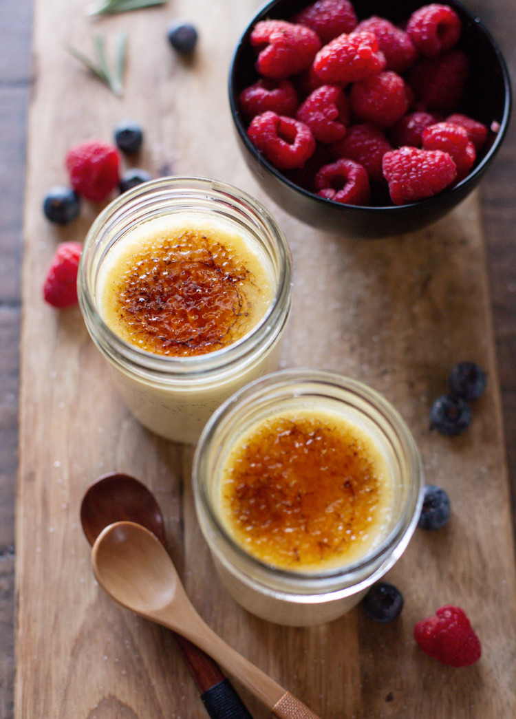 photo of 2 jars of sous vide creme brulee with fresh berries