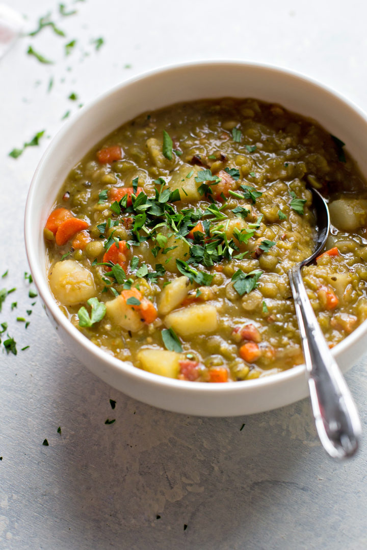 photo of this split pea soup with bacon recipe in a white bowl