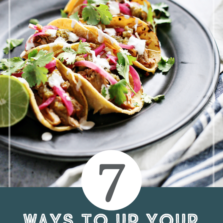 photo of shredded pork tacos for taco night with text that reads: 7 ways to up your taco tuesday game"