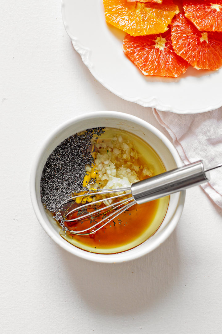 bowl of prepared salad dressing to use on a recipe for citrus salad