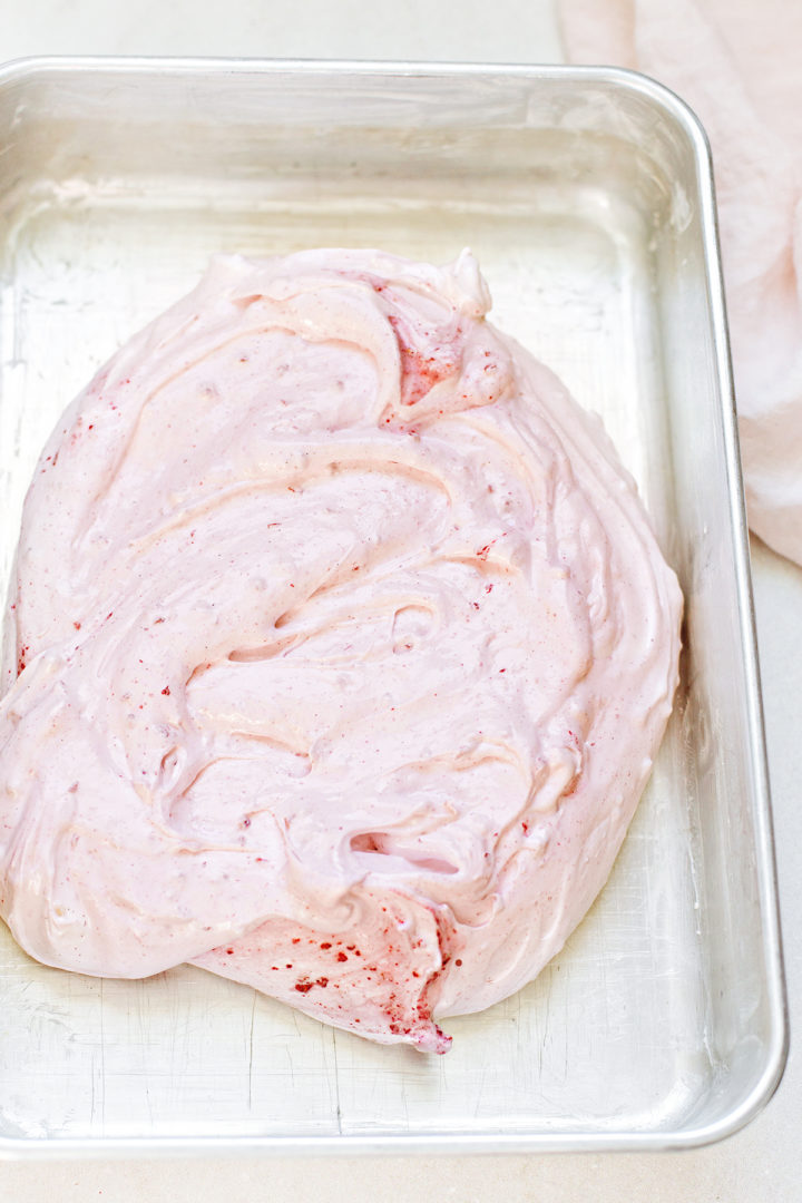 homemade marshmallow mixture being spread into a pan