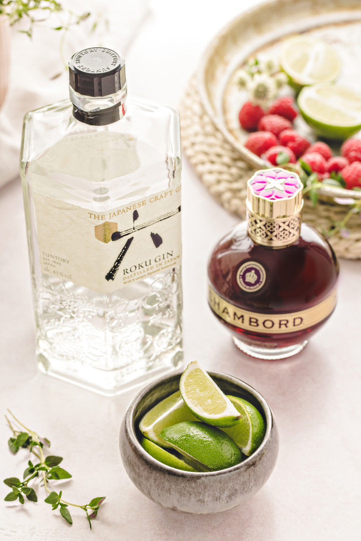 ingredients needed to make a floradora drink (a raspberry gin cocktail)