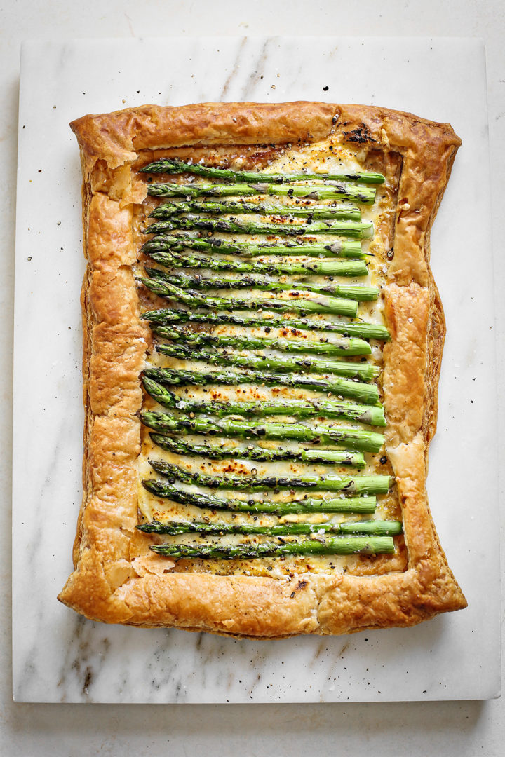 uncut puff pastry tart with asparagus fresh out of the oven