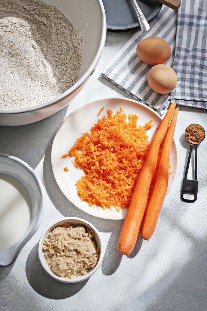 ingredients arranged on a counter to make a carrot cake pancake recipe