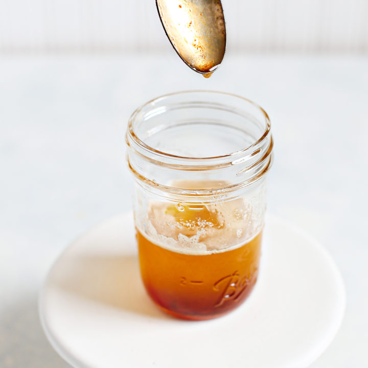 jar of browned butter with a spoon