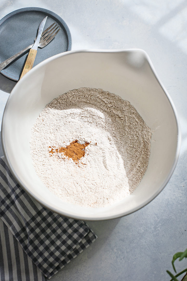combining the dry ingredients to make a recipe for carrot cake pancakes