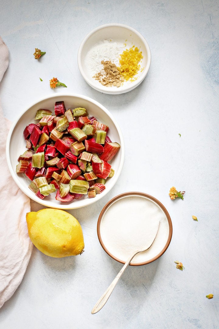 ingredients for rhubarb coffee cake recipe arranged in bowls