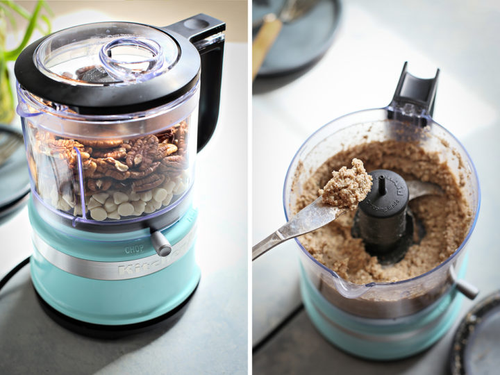 white chocolate and pecans being blended in a food processor to use as a topping for this recipe for carrot cake pancakes