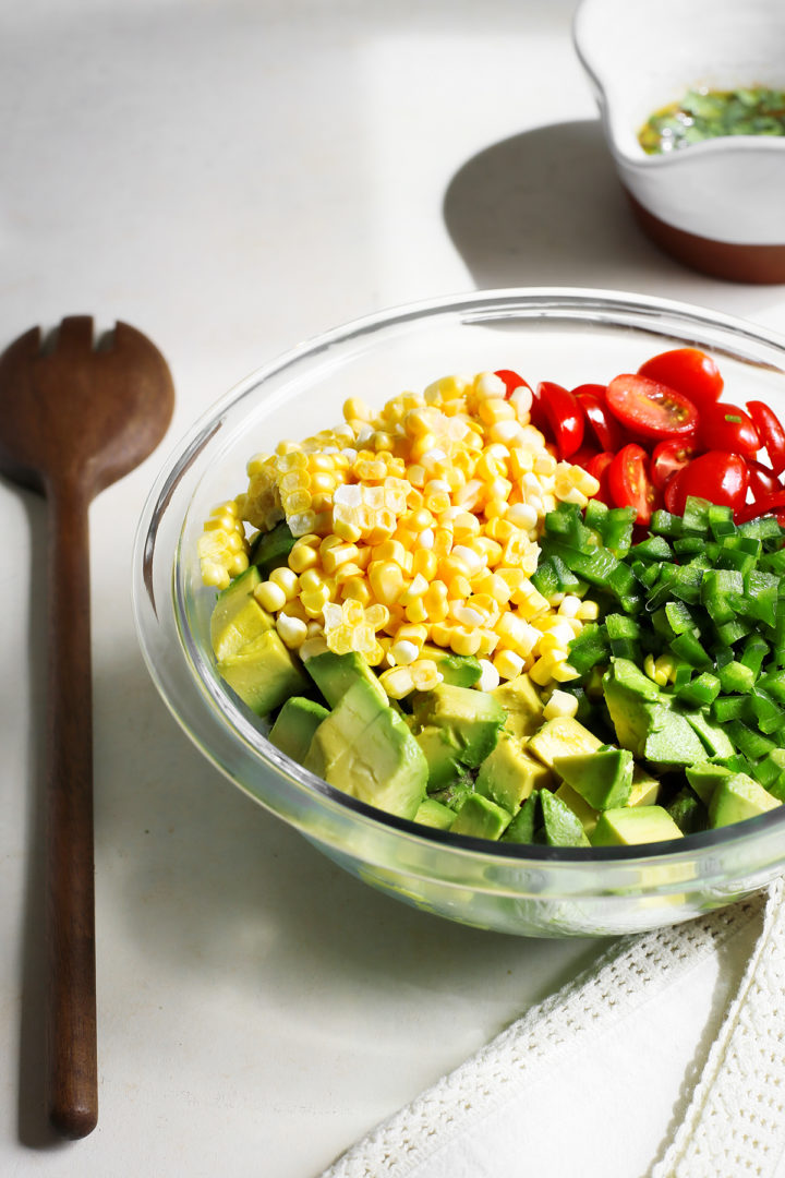 step 2 making avocado corn salsa with tomatoes