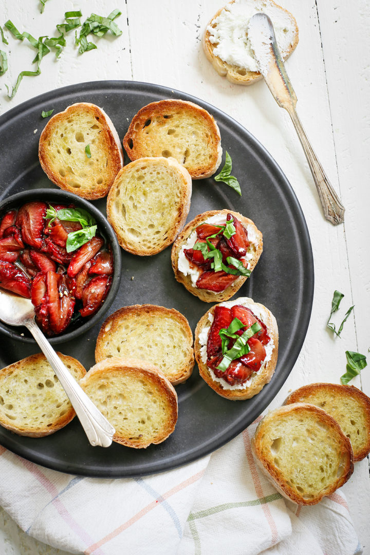 photo showing how to assemble strawberry balsamic bruschetta appetizer