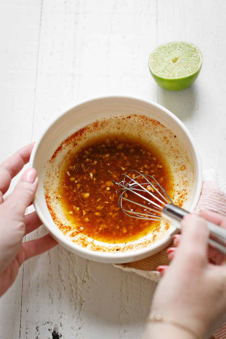 woman making the mushroom fajita marinade for vegetable fajitas	