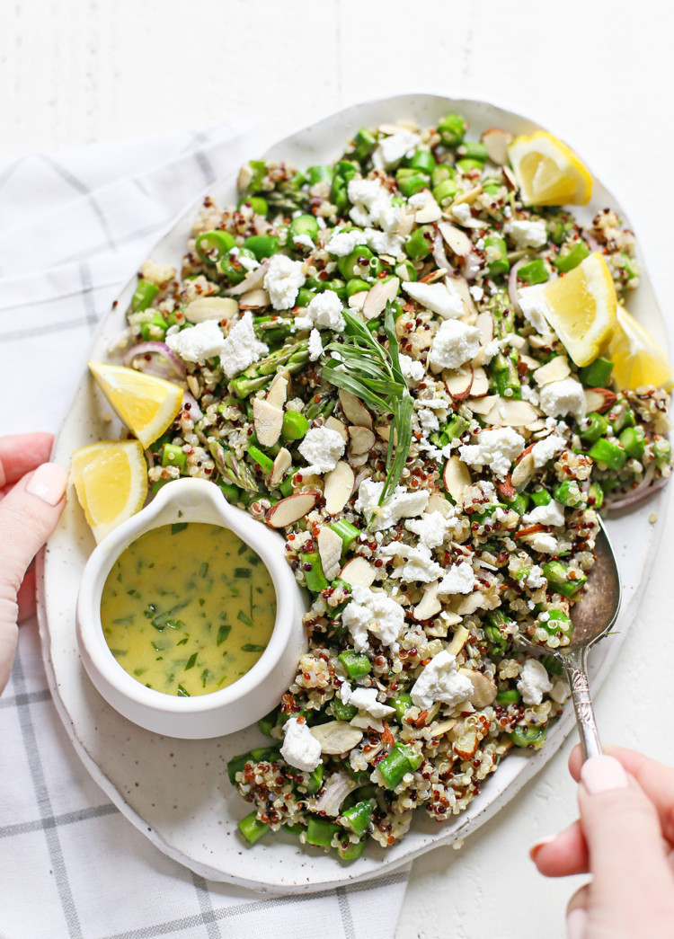 asparagus quinoa salad on a white platter