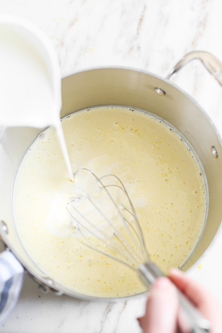 woman making the ice cream base for homemade lemon ice cream