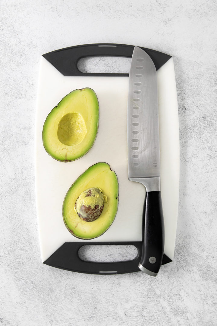 picture showing how to cut avocado in half