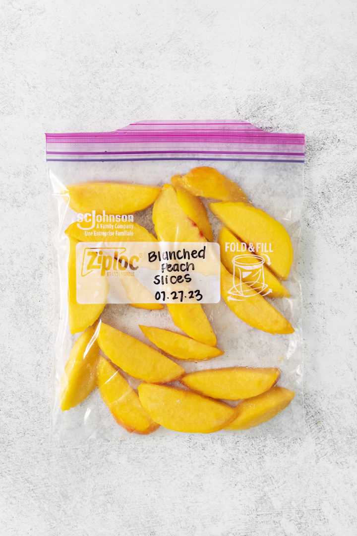sliced blanched peaches in a bag for freezing