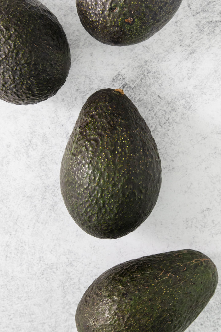 close up of fresh avocados before cutting