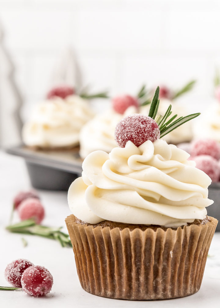 close up photo showing a garnish idea for gingerbread cupcakes with cream cheese frosting