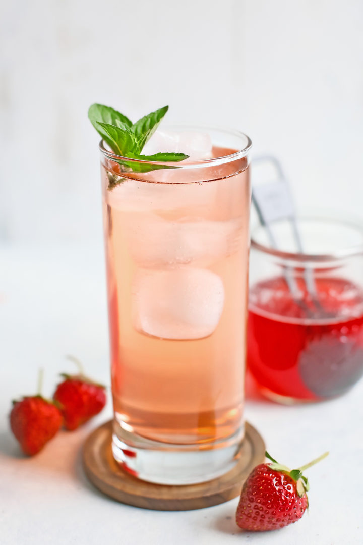 A drink made with strawberry simple syrup