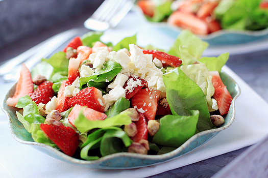 strawberry and goat cheese salad on a salad plate