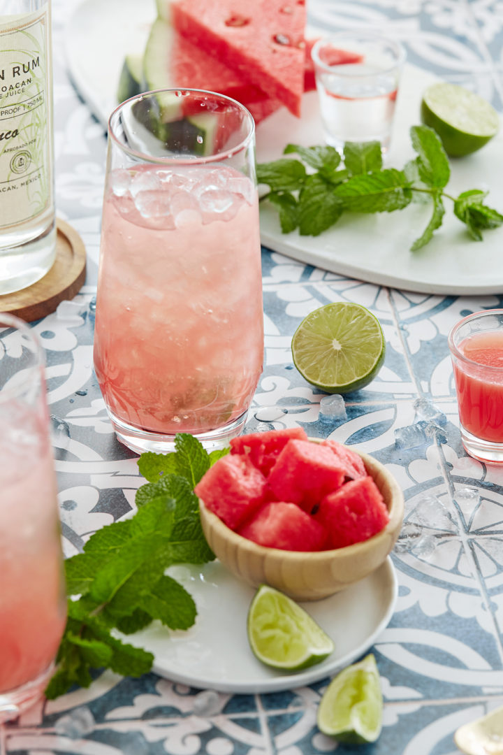 ice added to the glass with watermelon mojito ingredients