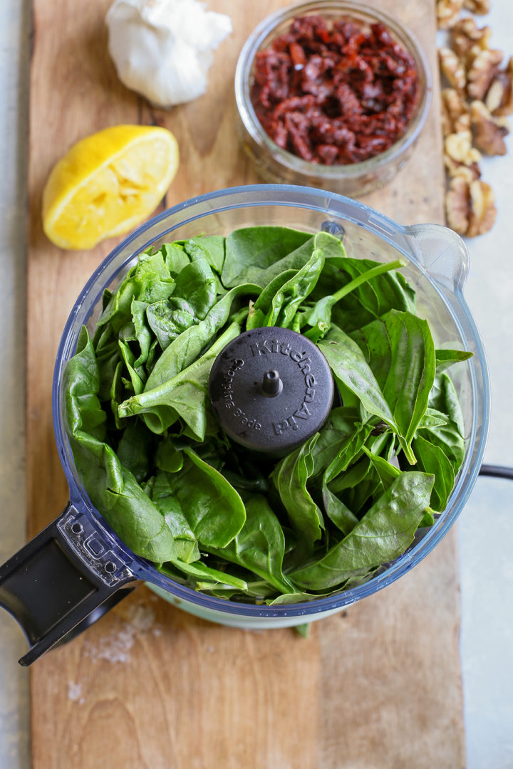 step showing how to make sun dried tomato pesto