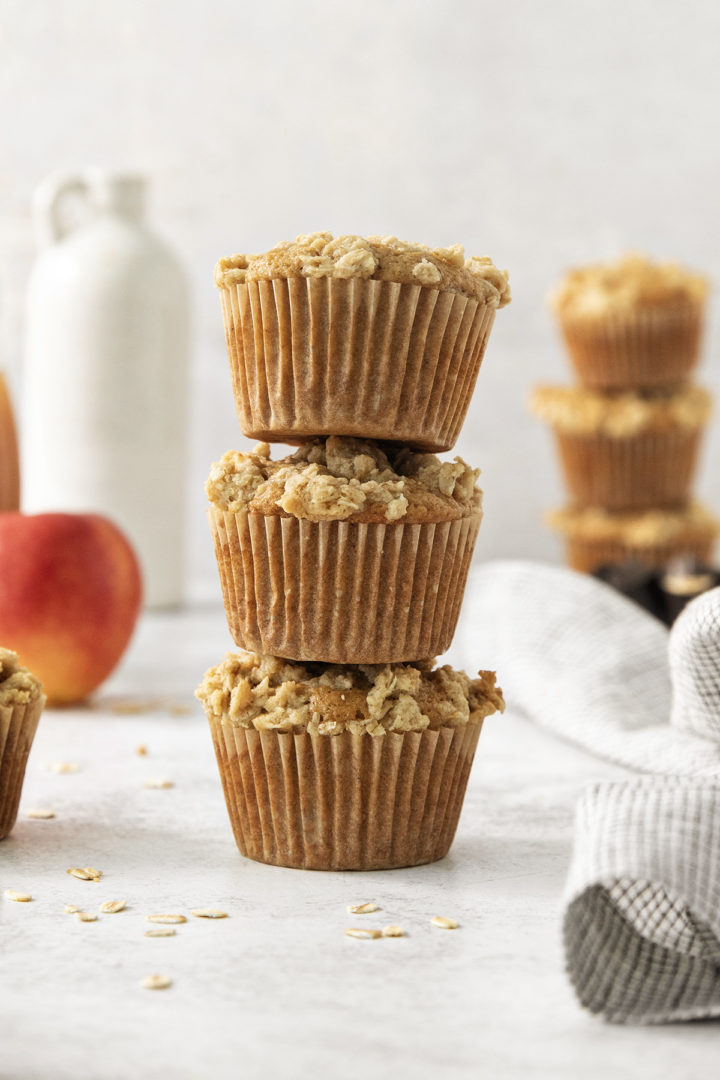 a stack of 3 apple cider muffins